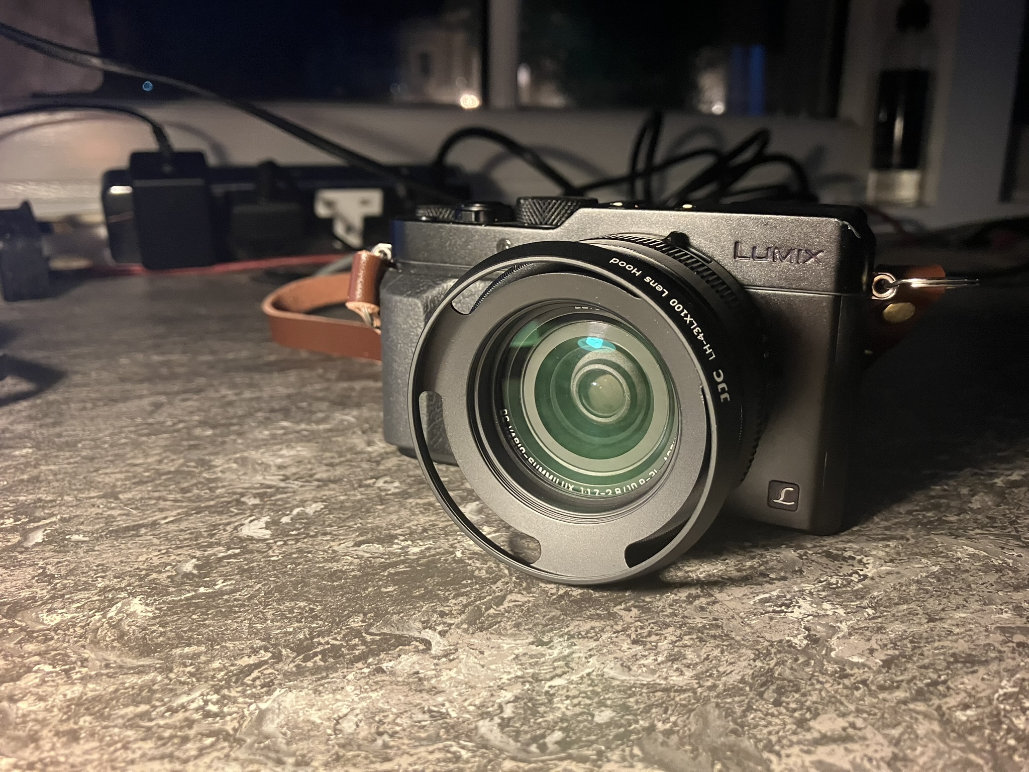Original Panasonic Lumix LX100 compact camera viewed from the front