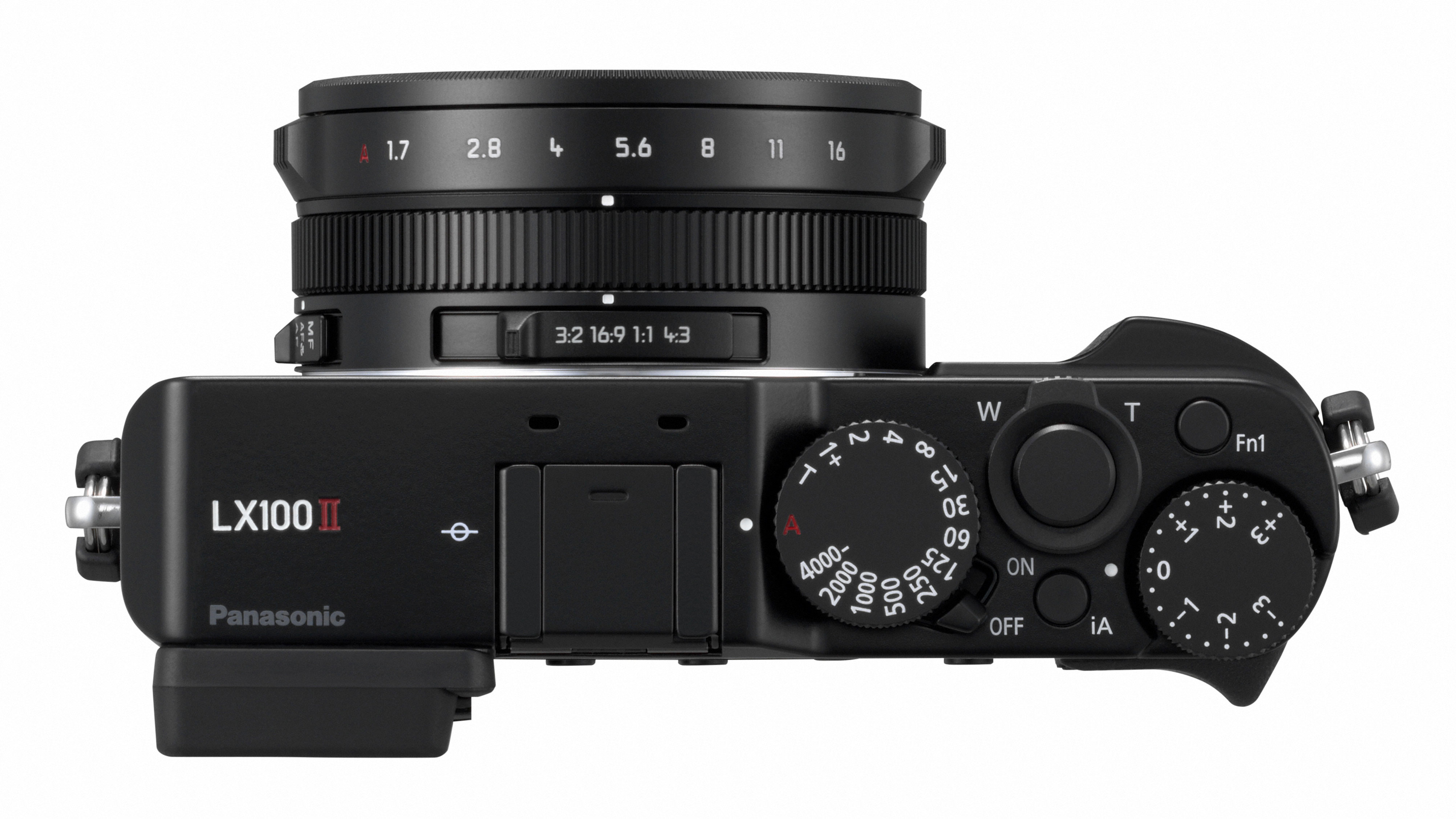 Top controls of the Panasonic Lumix LX100 II showing aperture, shutter speed and exposure compensation dials