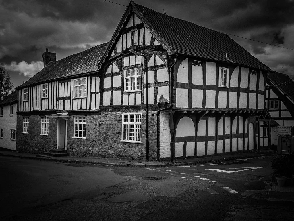 Historic half-timbered property in Weobley, Herefordshire photographed in black and white
