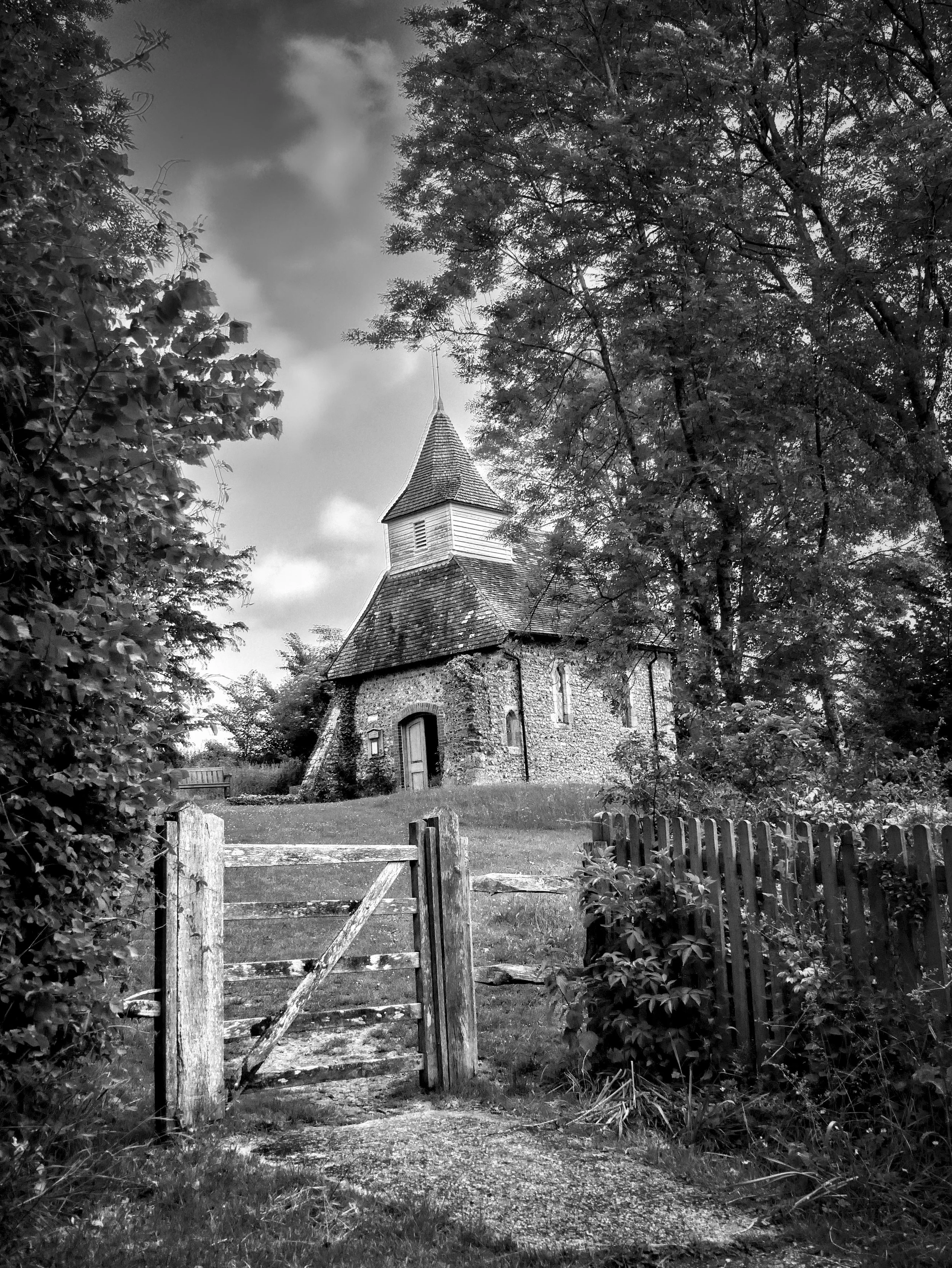 Small rural shepherd church photographed in black and white