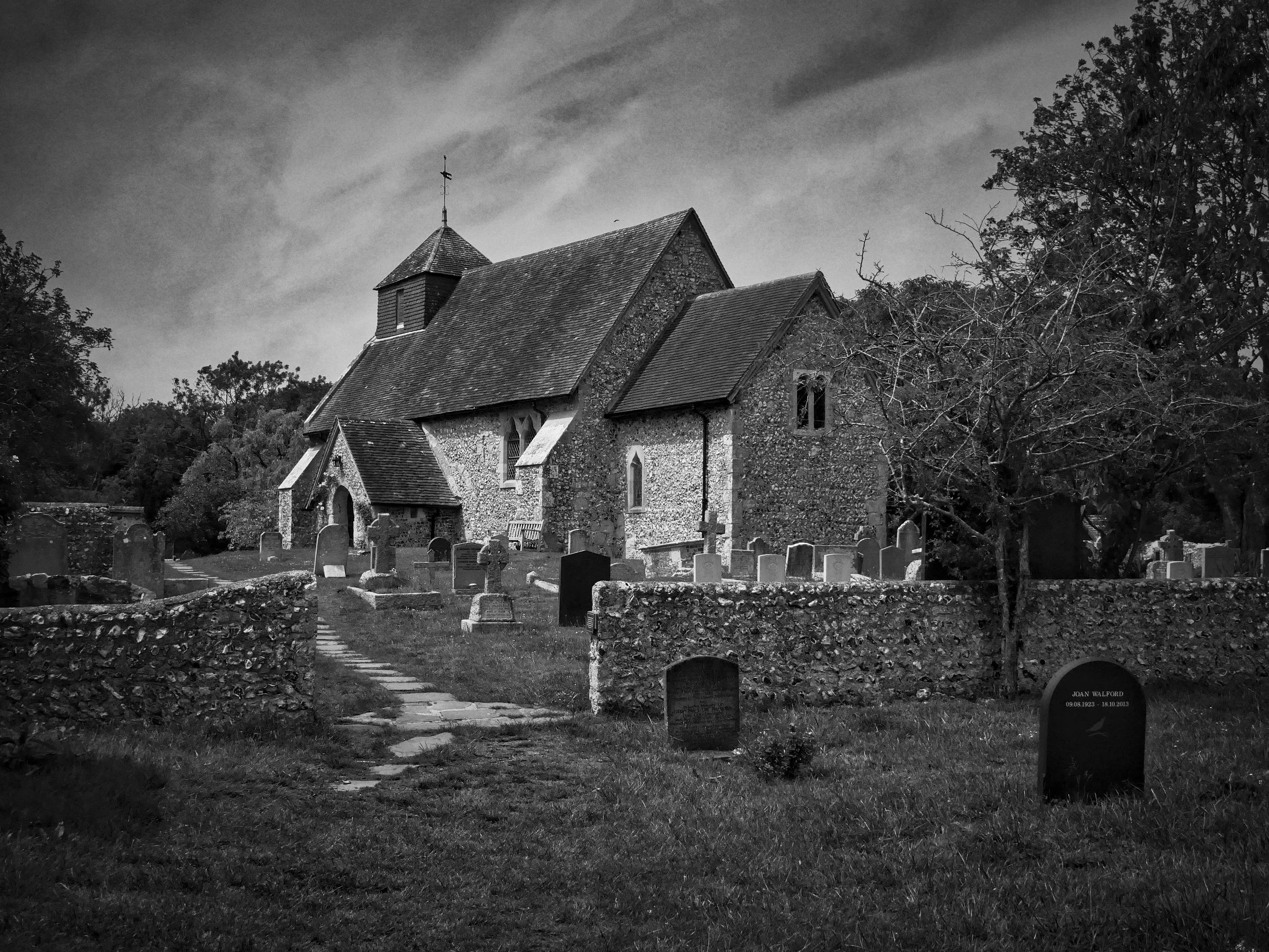 Friston Church in the South Downs photographed in black and white
