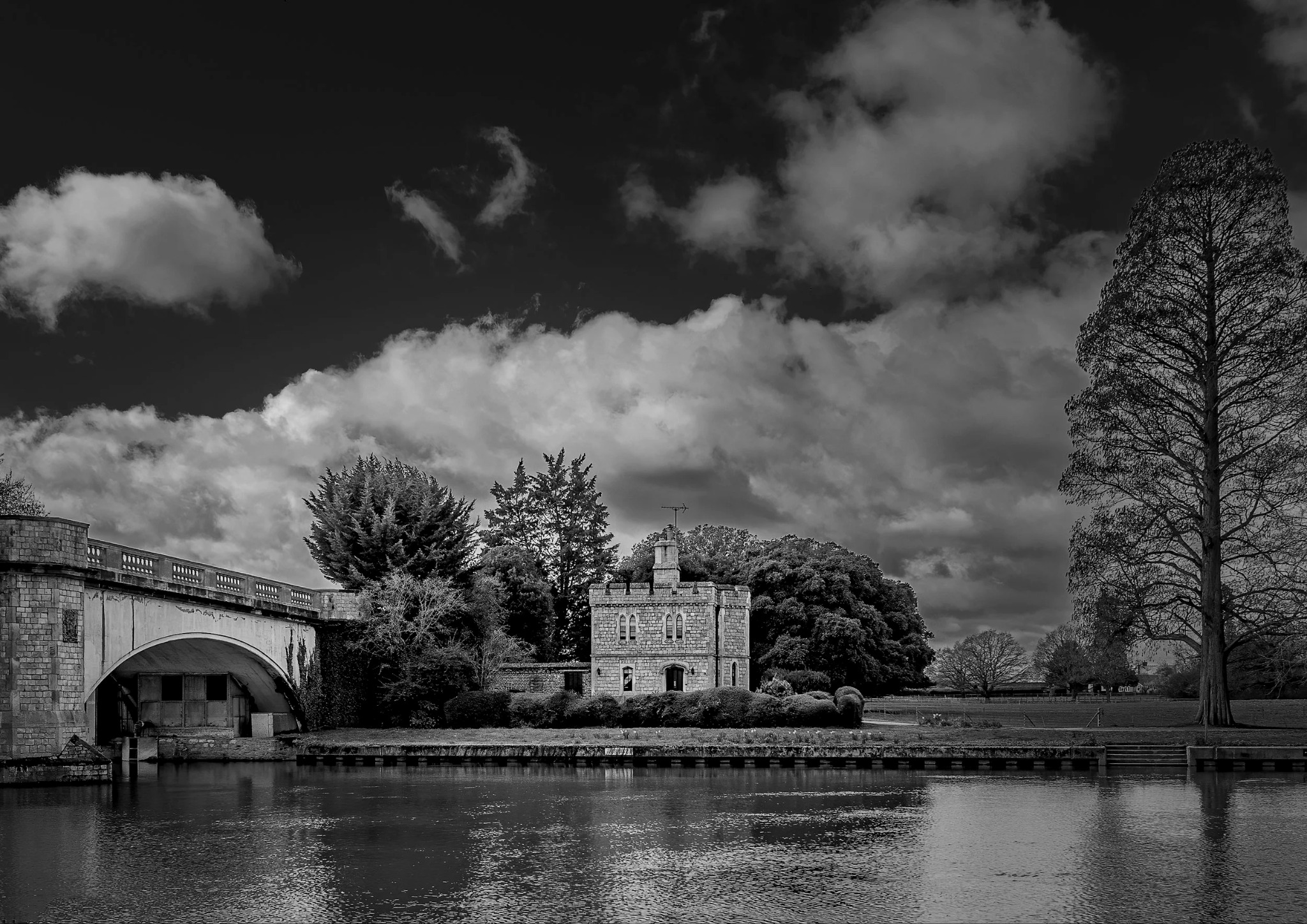 Large arched bridge and riverside building