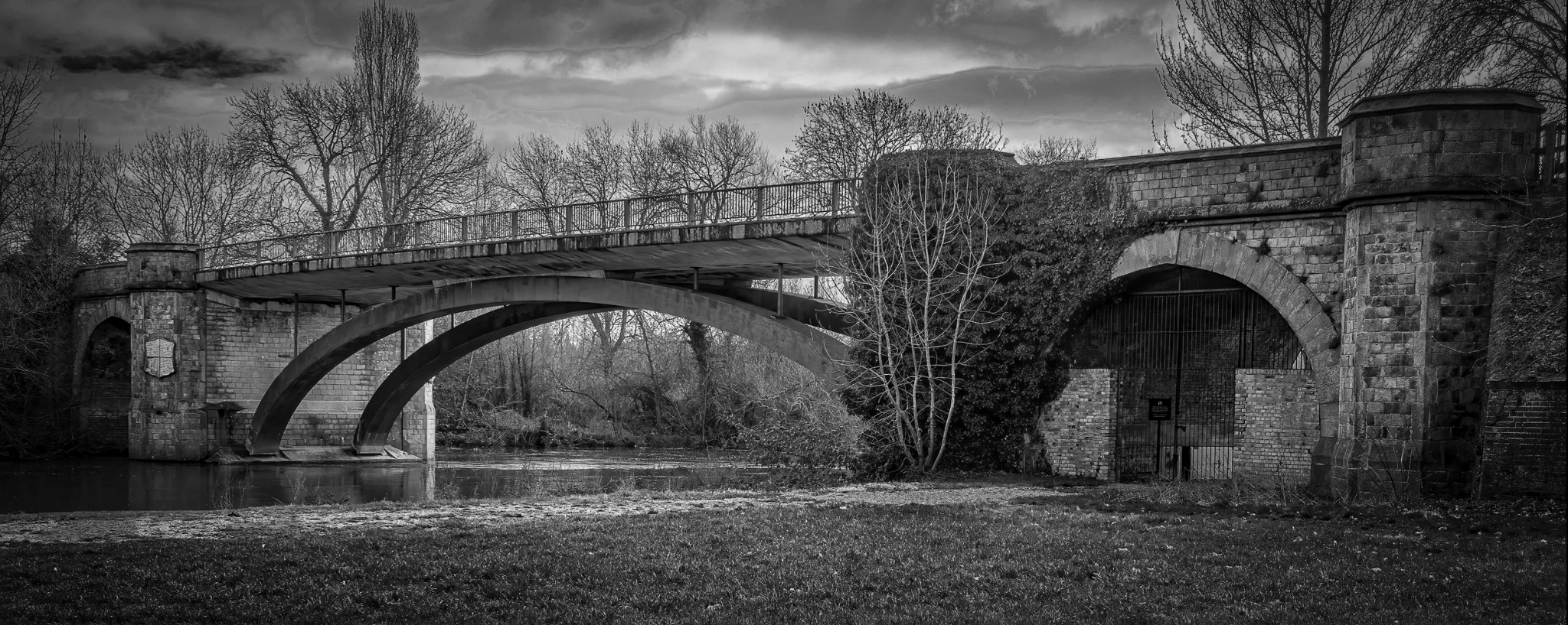 Historic bridge structure in black and white