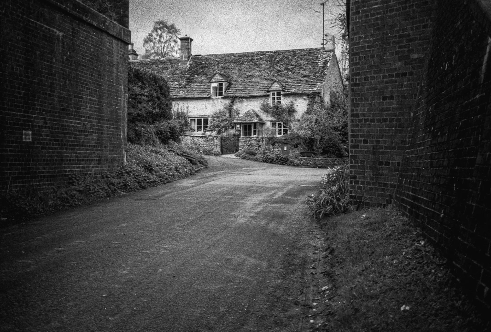 Old Post Office and village lane in Chedworth