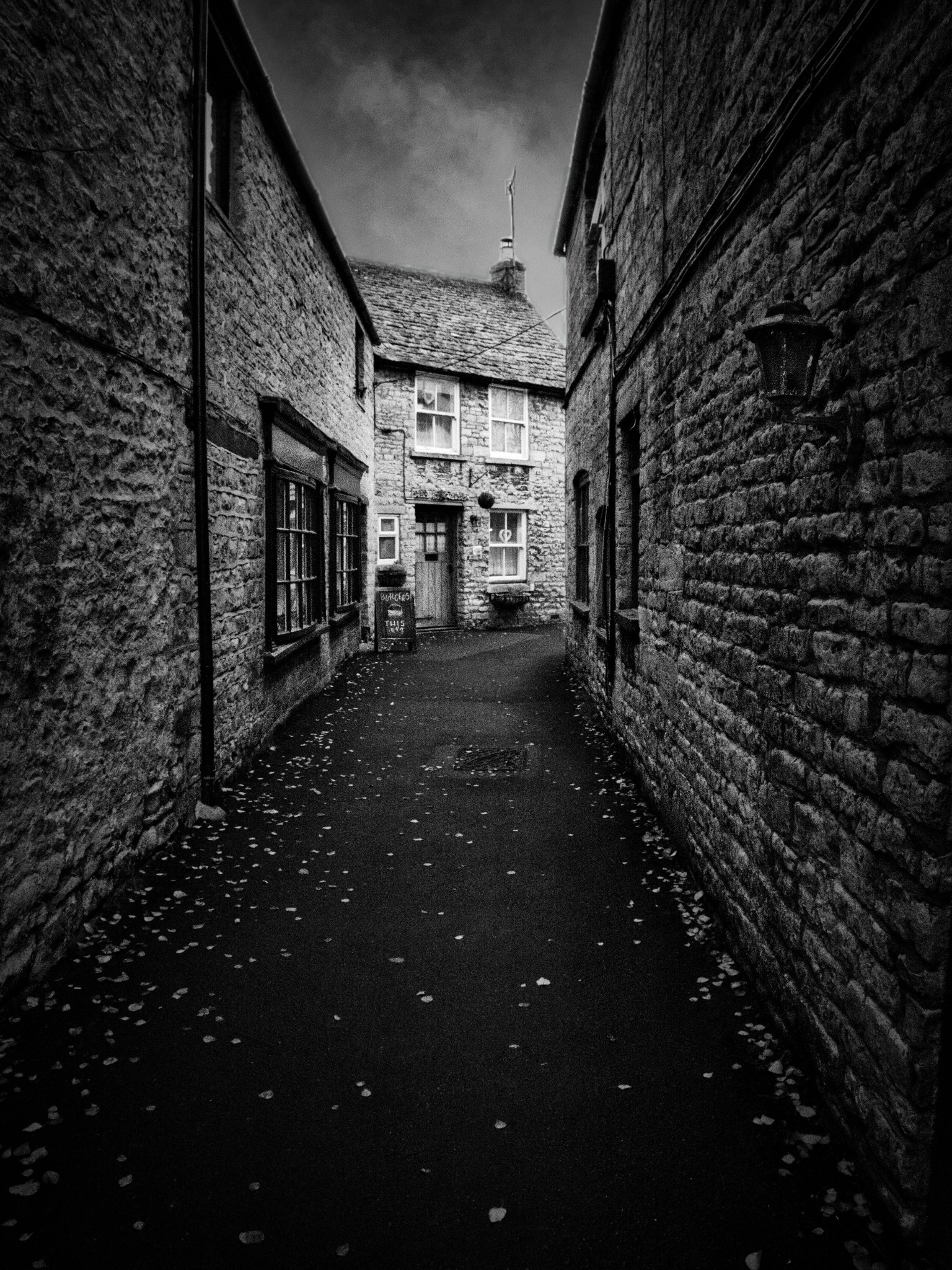 Narrow stone alley in the Cotswolds