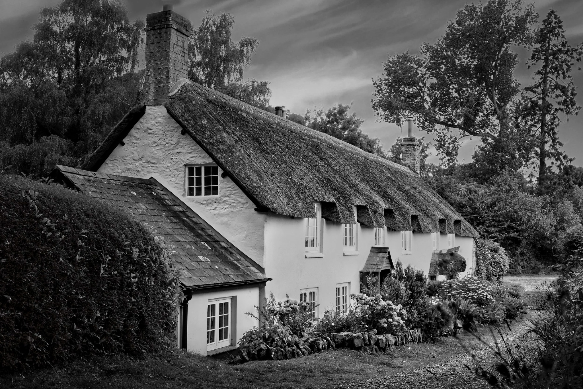 Timber-framed country cottage doorway and garden