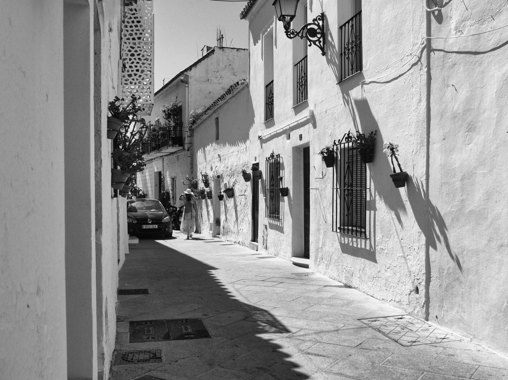 Spain village street photography sunlit walkway