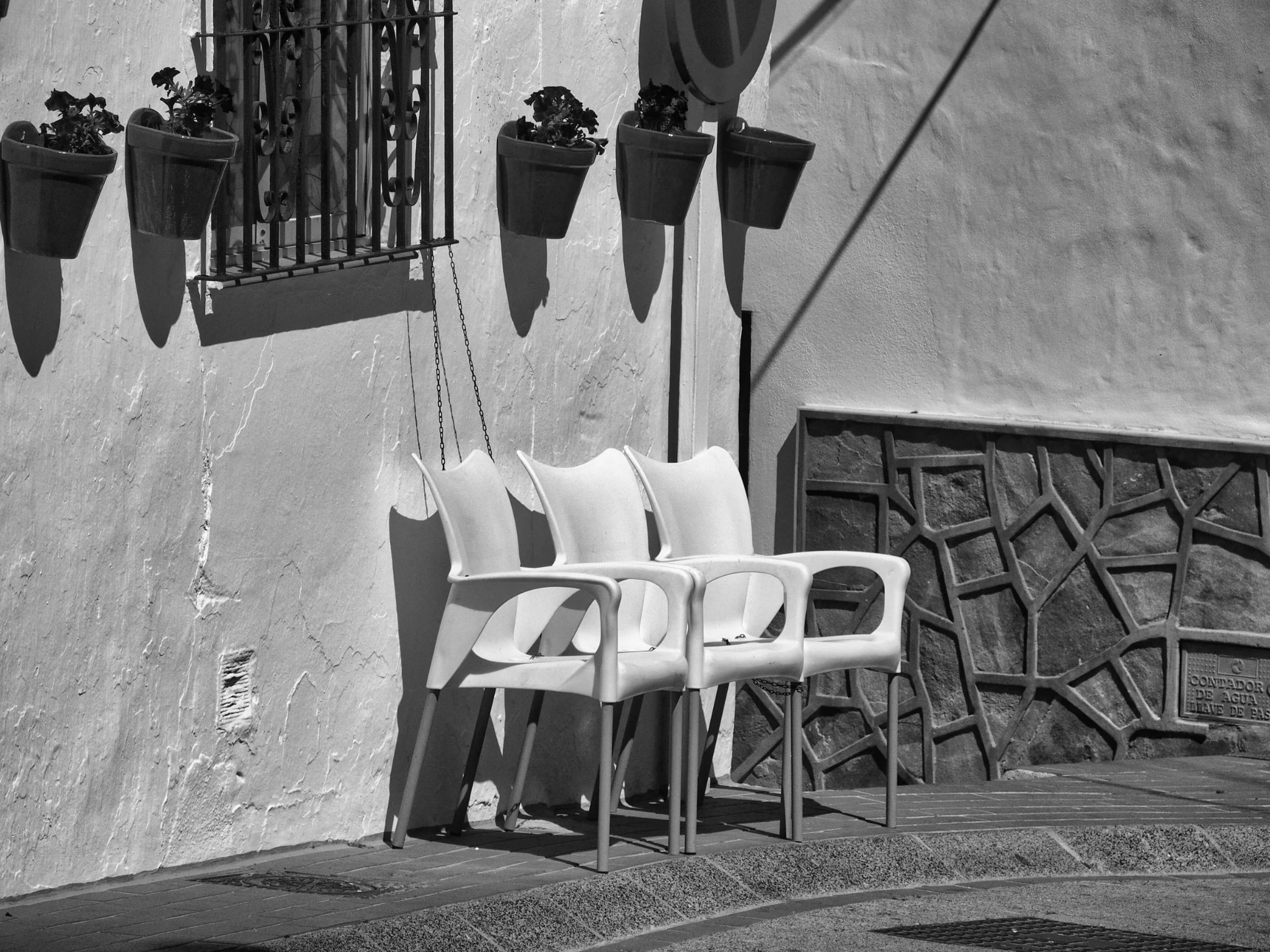 Minimalist street photography white chairs