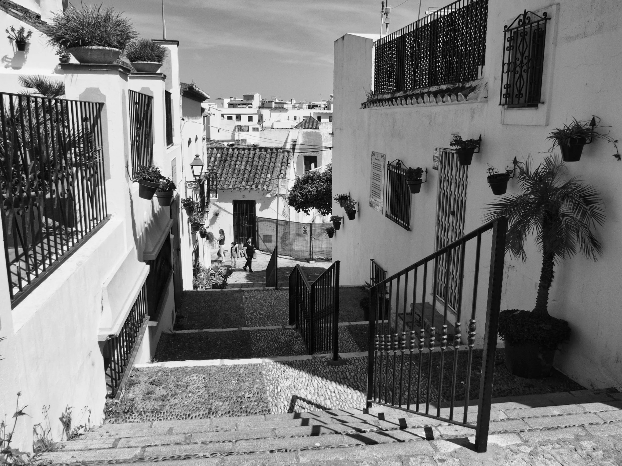Steep stepped street whitewashed buildings andalusia village