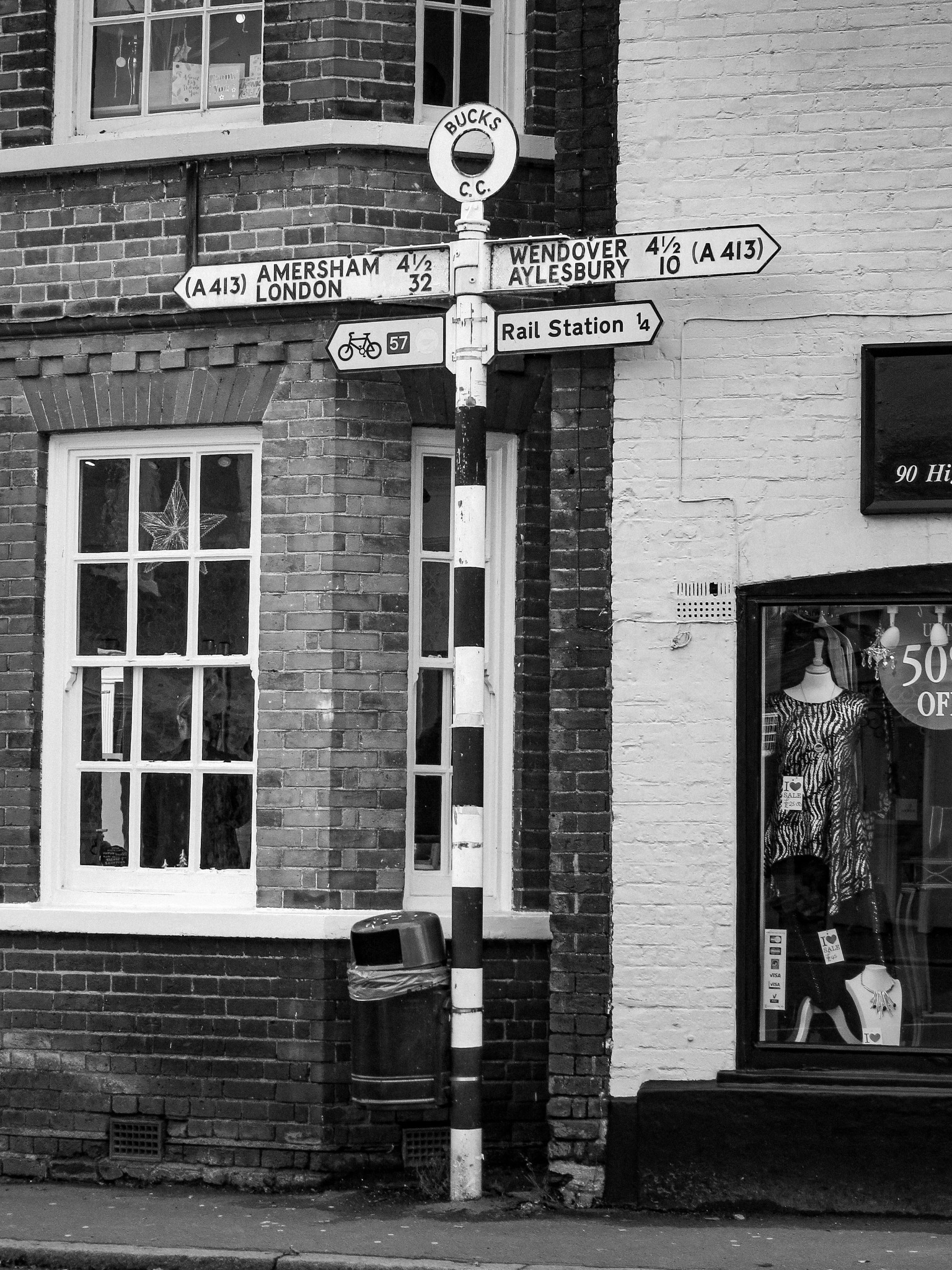 Traditional Buckinghamshire road signpost on a street corner