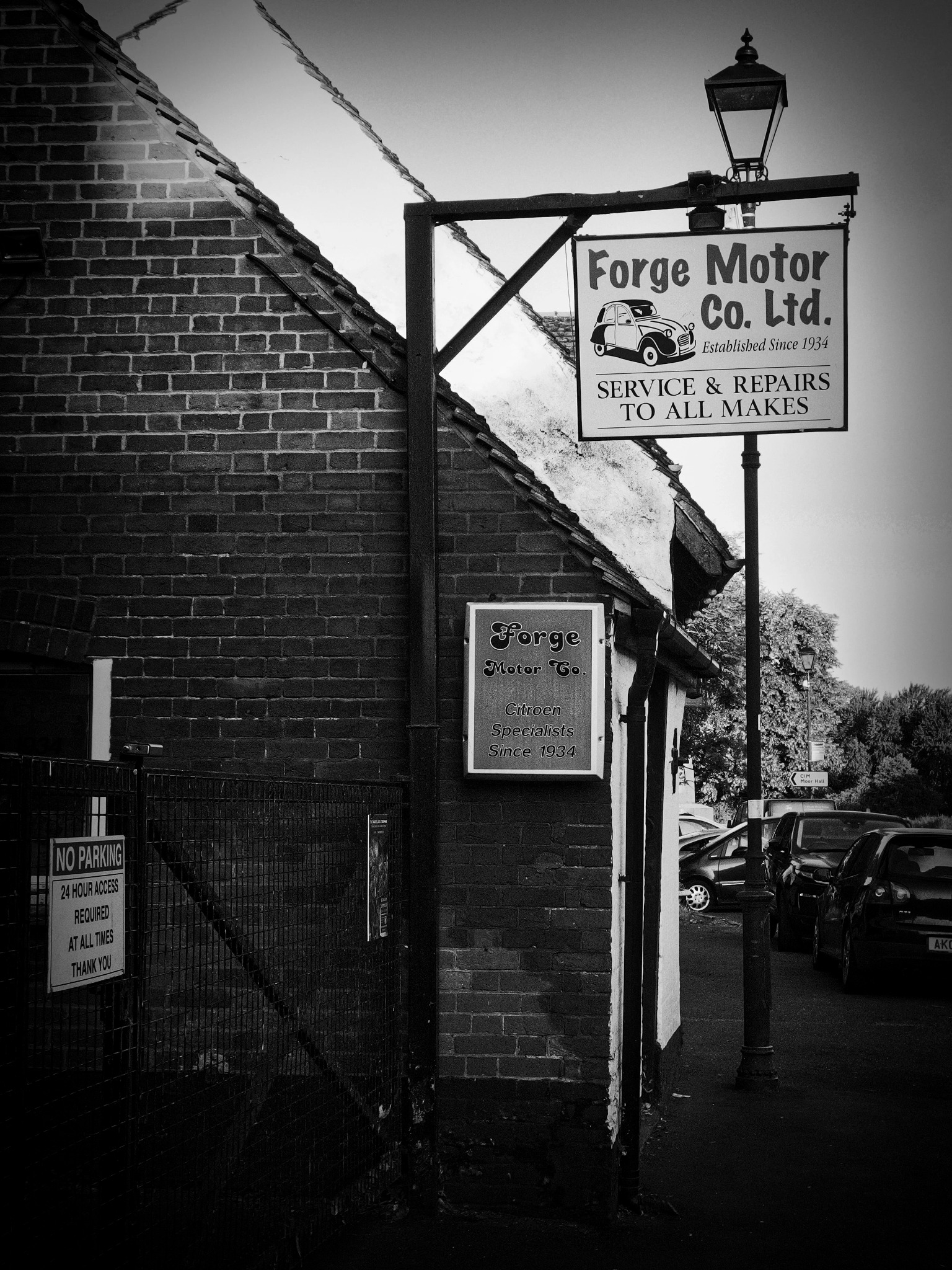 Forge Motor Company village garage sign